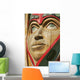 Close Up Of A Face On A Traditional Haida Totem Carving In Ketchikan Wall Mural