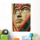 Close Up Of A Face On A Traditional Haida Totem Carving In Ketchikan Wall Mural