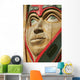 Close Up Of A Face On A Traditional Haida Totem Carving In Ketchikan Wall Mural