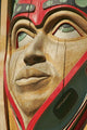 Close Up Of A Face On A Traditional Haida Totem Carving In Ketchikan Wall Mural