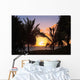 Hawaii, Oahu, Kailua, Lanikai, Vibrant sunset with a couple on beach Wall Mural