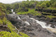 Hawaii, Maui, Hana, Seven Sacred Pools, a large stream and waterfalls Wall Mural