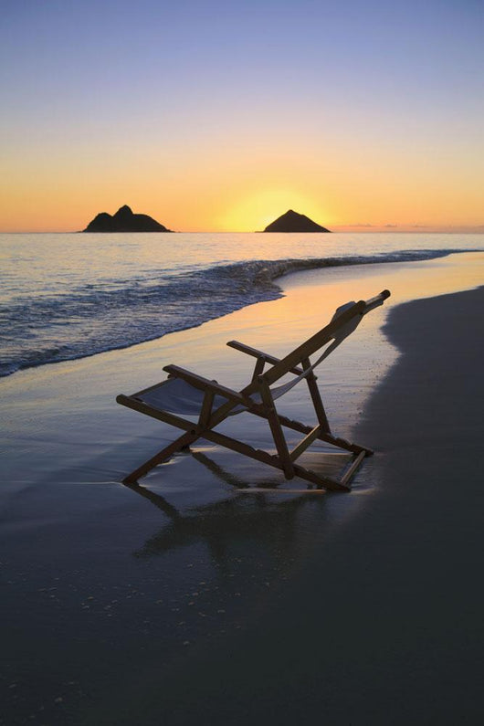 Hawaii, Lanikai, Empty beach chair at sunset Wall Mural