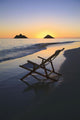 Hawaii, Lanikai, Empty beach chair at sunset Wall Mural