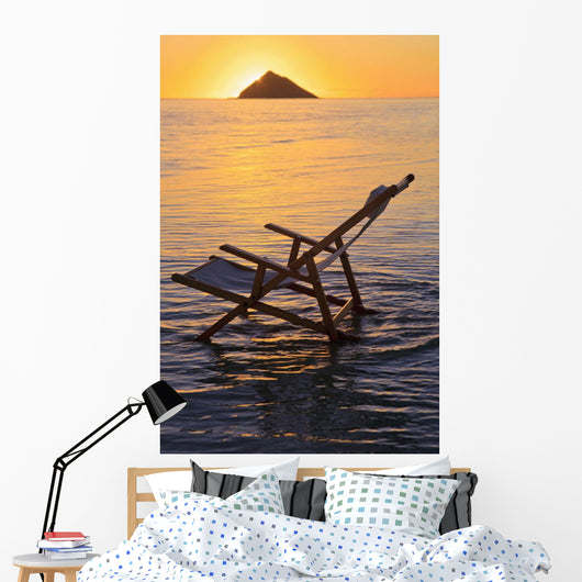 Hawaii, Lanikai, Empty beach chair at sunset Wall Mural