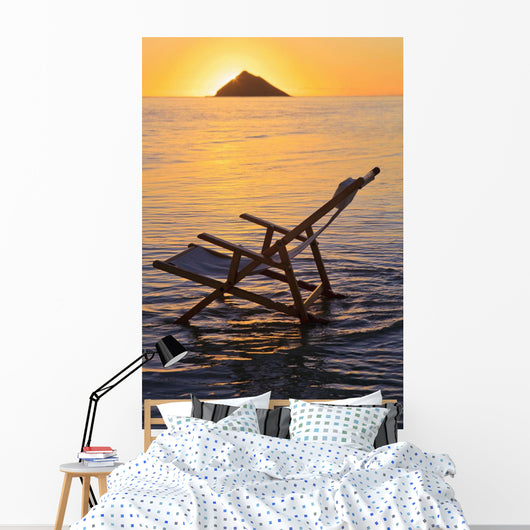 Hawaii, Lanikai, Empty beach chair at sunset Wall Mural
