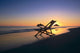Hawaii, Lanikai, Empty beach chair at sunset Wall Mural