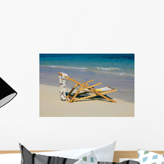 A lounge chair on the white sandy beach of Lanikai Wall Mural