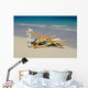 A lounge chair on the white sandy beach of Lanikai Wall Mural