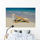 A lounge chair on the white sandy beach of Lanikai Wall Mural