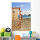 A lounge chair on the white sandy beach of Lanikai Wall Mural