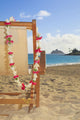 A lounge chair on the white sandy beach of Lanikai Wall Mural