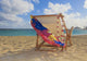 A lounge chair on the white sandy beach of Lanikai Wall Mural