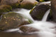 Hawaii, Maui, Iao River Valley, water in motion over rocks Wall Mural
