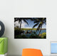 Hawaii, Maui, A sunny view of Waianapanapa from behind palm trees Wall Mural