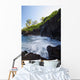 The rocky coastline of Waianapanapa showing the movement of the water Wall Mural