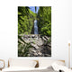 Hawaii, Maui, Hana, A waterfall surrounded by lush bamboo plants Wall Mural