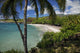 A sunny view of Hamoa Beach with clear ocean on a calm day Wall Mural