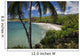 A sunny view of Hamoa Beach with clear ocean on a calm day Wall Mural