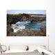 Hawaii, Maui, Hana, Lava rock formation arches over ocean Wall Mural
