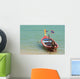 Close up of longtail boats along the in water Wall Mural