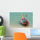 Close up of longtail boats along the in water Wall Mural