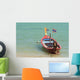 Close up of longtail boats along the in water Wall Mural