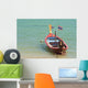 Close up of longtail boats along the in water Wall Mural