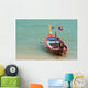 Close up of longtail boats along the in water Wall Mural