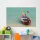 Close up of longtail boats along the in water Wall Mural
