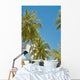 Thailand, Phuket, Vibrant palm trees and clear blue sky Wall Mural