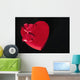 Valentines heart-shaped candy box against black background Wall Mural
