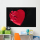 Valentines heart-shaped candy box against black background Wall Mural