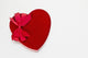 Valentines heart-shaped candy box against white background Wall Mural