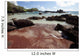Hawaii, Maui, Hana, A sunny view of Koki Beach on a calm day Wall Mural