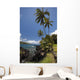 Palm trees and sunny blue sky on the Keanae coast Wall Mural