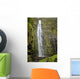 Hawaii, Maui, A waterfall in Kipahulu with lush foliage Wall Mural