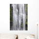 Hawaii, Maui, A waterfall in Kipahulu with lush foliage Wall Mural