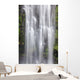 Hawaii, Maui, A waterfall in Kipahulu with lush foliage Wall Mural