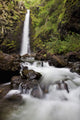 Hawaii, Maui, Kaupo, A sunny view of Alalele Falls Wall Mural