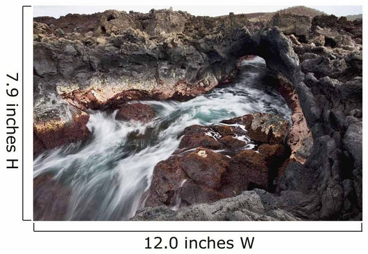 Hawaii, Maui, Makena, Ocean water moving through a lava tube Wall Mural