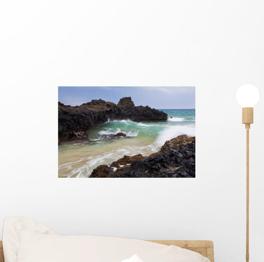 Hawaii, Maui, Makena, Ocean wave on rocky coastline Wall Mural