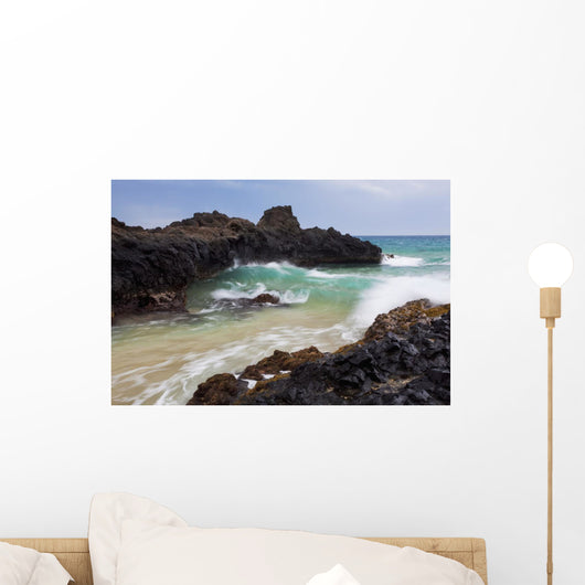 Hawaii, Maui, Makena, Ocean wave on rocky coastline Wall Mural