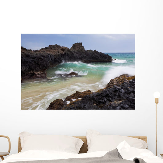 Hawaii, Maui, Makena, Ocean wave on rocky coastline Wall Mural