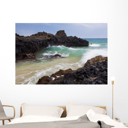 Hawaii, Maui, Makena, Ocean wave on rocky coastline Wall Mural