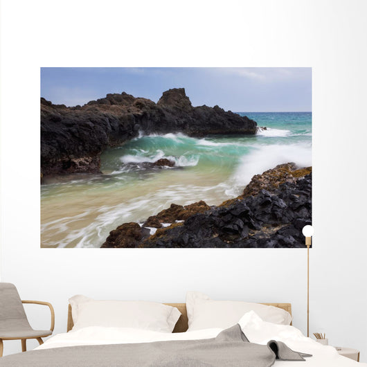Hawaii, Maui, Makena, Ocean wave on rocky coastline Wall Mural