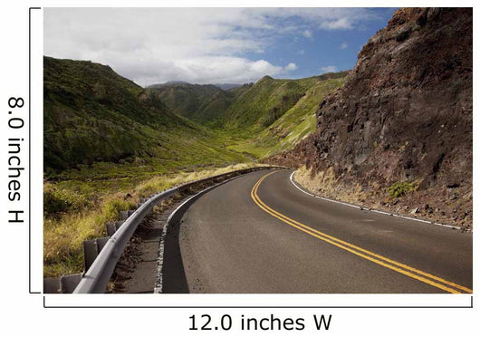 A winding road through Maui's west side with lush mountains Wall Mural