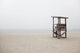 Abandoned lifeguard station on beach Wall Mural