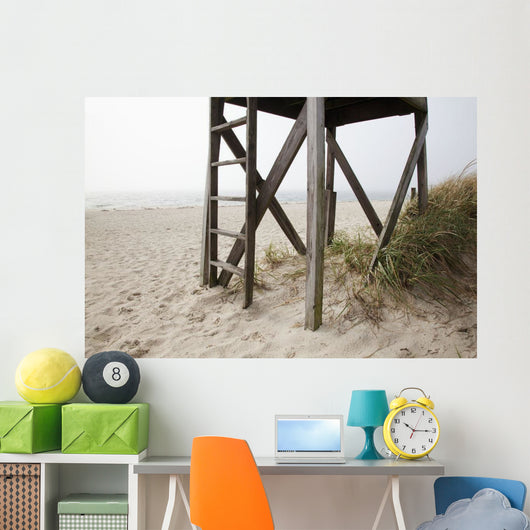 Close up of an abandoned lifeguard station on beach Wall Mural