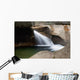 A forest riverbed and waterfall Wall Mural